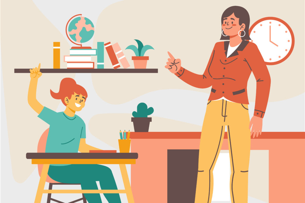 Docente instruye a estudiante en el salón de clases.