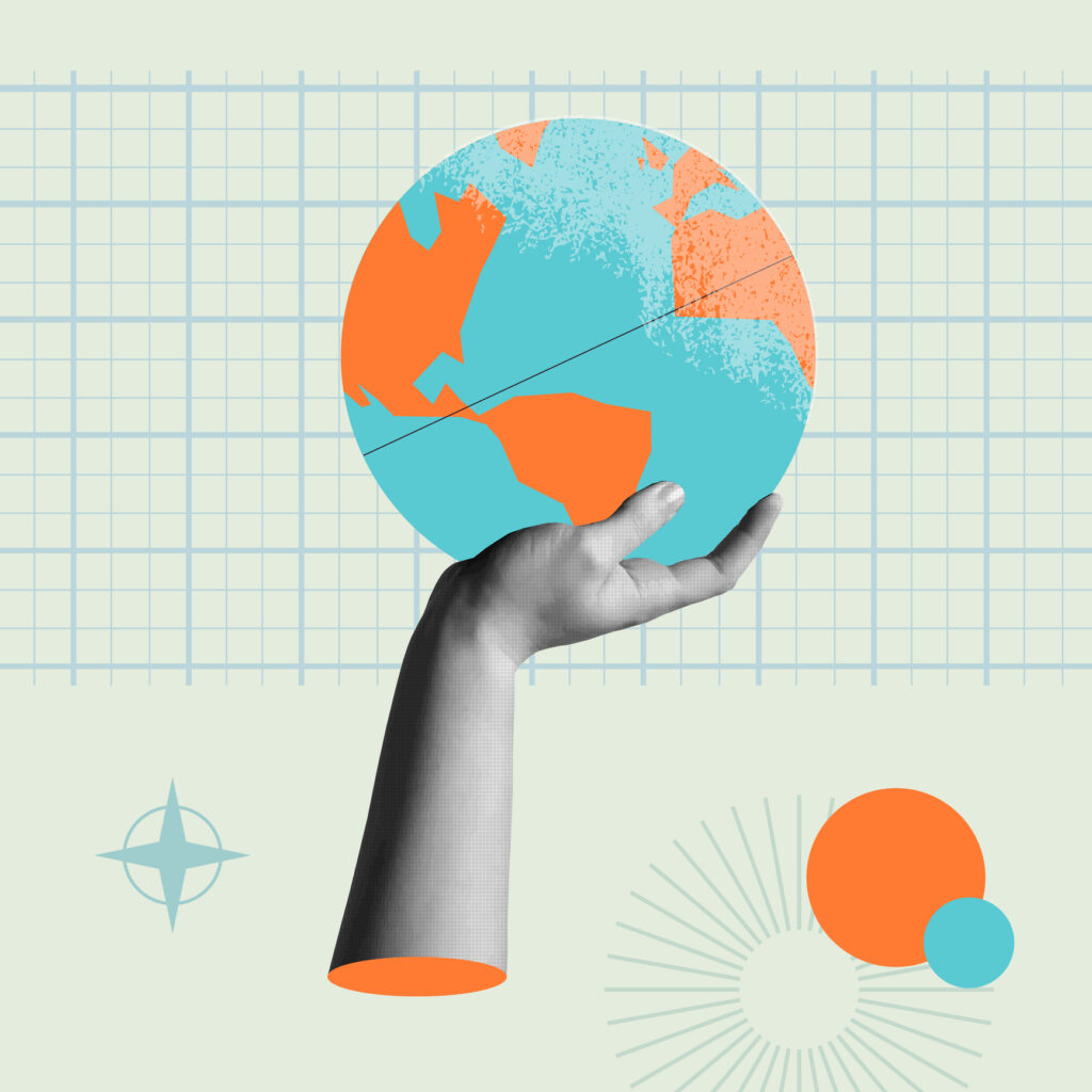 mano humana sosteniendo un globo de la tierra