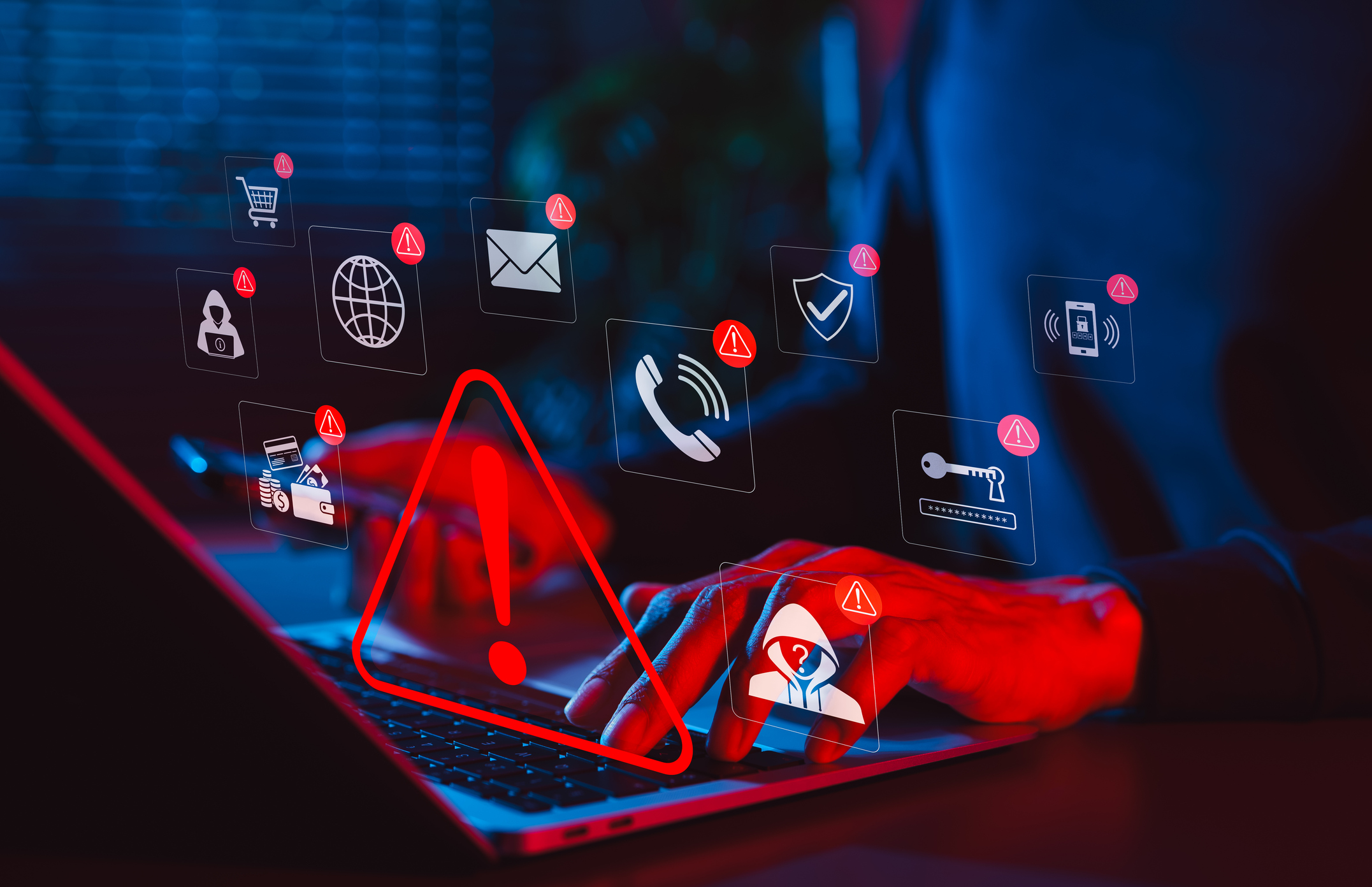 Online scam alert and cybersecurity warning concept. Man holding phone while using laptop, warning sign for scam with icons online threats, phishing, cyber secure, unknown person, suspicious scammer,